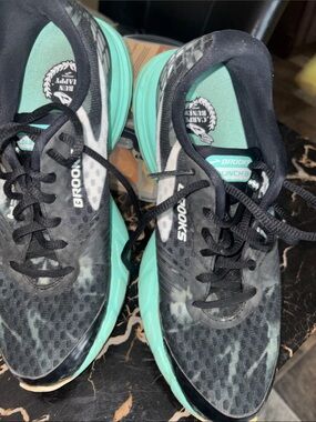 Brooks Women's Running Shoes in Black & Mint these are in really good condition